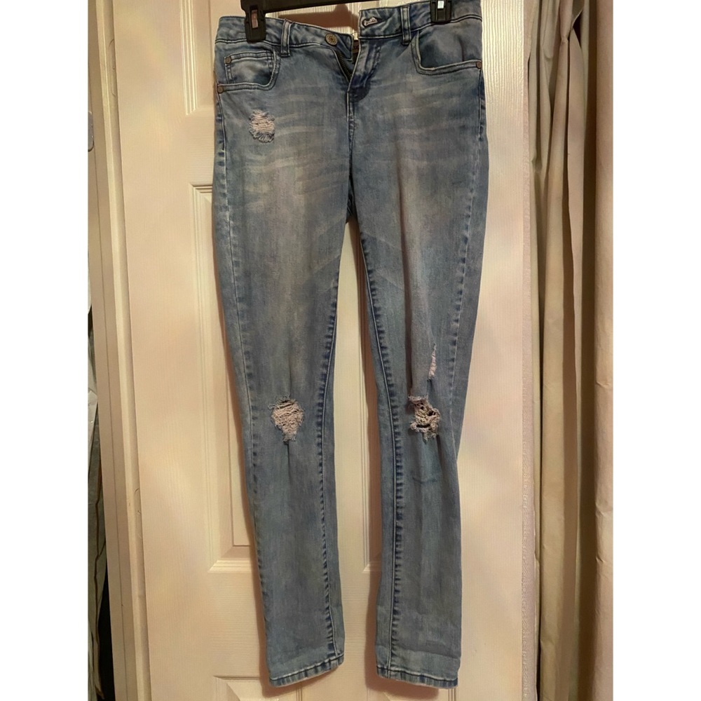 Skinny light wash ripped jeans